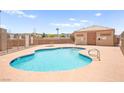 Community pool with clear blue water and a pool house offers a refreshing escape at 4655 Gold Dust Ave # 210, Las Vegas, NV 89120
