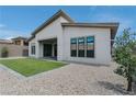 Home with green grass in the backyard at 11173 Concord Valley Dr, Las Vegas, NV 89135