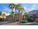 Charming single-Gathering home with mature palm trees and a well-manicured lawn at 23 Indian Run Way, Las Vegas, NV 89148