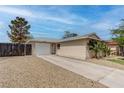 Charming single-story home with a driveway, a one-car garage and desert landscaping at 4739 Glenndavis Dr, Las Vegas, NV 89121