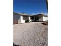 Exterior view featuring a well-maintained gravel front yard at 105 Huntly Rd, Las Vegas, NV 89145