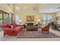 Bright living room with vaulted ceilings and comfortable furniture arrangement at 2033 Summer Spruce Pl # 102, Las Vegas, NV 89134