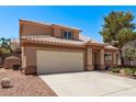 Attractive two-story home with a two-car garage and well-kept front yard landscaping at 2037 Merano Ct, Las Vegas, NV 89123
