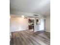 Bright living room with hardwood floors, an open layout, and seamless flow into the kitchen at 2120 Ramrod Ave # 2216, Henderson, NV 89014