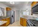 Well-equipped kitchen with stainless steel appliances and granite countertops at 698 S Racetrack Rd # 1714, Henderson, NV 89015
