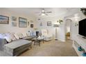 Cozy living room features comfortable seating, stylish decor, and neutral carpet at 698 S Racetrack Rd # 1714, Henderson, NV 89015