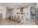 Spacious kitchen features a large center island with seating and modern appliances at 7126 Mirkwood Ave, Las Vegas, NV 89178