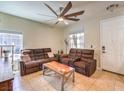 Comfortable living room with a ceiling fan and plush seating at 982 Sable Chase Pl, Henderson, NV 89011