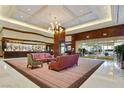 Elegant lobby featuring modern seating, stylish decor, and sophisticated lighting at 135 E Harmon Ave # 1401, Las Vegas, NV 89109