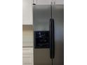 Close up of stainless steel refrigerator with water and ice dispenser at 6320 Shawnee Ave, Las Vegas, NV 89107