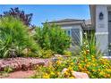 Inviting home exterior with desert landscaping at 7029 Bocaire Dr, Las Vegas, NV 89131
