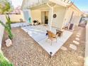 Cozy outdoor patio area with seating, a grill, and a covered pergola for relaxing at 3372 Wayward Ct, Las Vegas, NV 89129