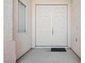 Inviting double front doors, creating a grand entrance to this lovely home at 4323 Village Spring St, Las Vegas, NV 89147