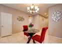 Cozy dining area featuring a modern light fixture and stylish decorations at 462 Fortissimo St, Henderson, NV 89011