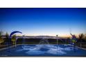 Splash pad with water features and beautiful skyline at dusk at 462 Fortissimo St, Henderson, NV 89011