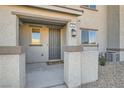 Inviting covered front porch with decorative pillars and manicured gravel landscaping at 762 Star Estates Ave # 0, North Las Vegas, NV 89086