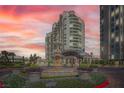 Luxury high-rise residence featuring meticulously landscaped grounds and elegant fountain, offering an upscale living experience at 9101 Alta Dr # 1203, Las Vegas, NV 89145