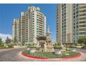 Luxury high-rise residence featuring meticulously landscaped grounds and elegant fountain, offering an upscale living experience at 9101 Alta Dr # 1203, Las Vegas, NV 89145