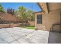 Nice backyard patio with a custom brick wall for additional privacy at 10373 Hawk Ravine St, Las Vegas, NV 89178