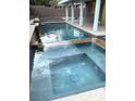 Inviting backyard pool and spa with a tile surround, a perfect space for relaxation and outdoor fun at 1367 Sun Pillars Ave, Henderson, NV 89014