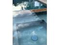 Inviting backyard pool and spa with a tile surround, a perfect space for relaxation and outdoor fun at 1367 Sun Pillars Ave, Henderson, NV 89014