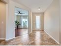 Inviting foyer featuring tile flooring, neutral walls, and a view into the home at 2148 Shadow Canyon Dr, Henderson, NV 89044