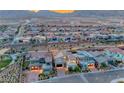 Beautiful homes in a desert community with mountain views offer modern exteriors and attractive landscaping at 365 Crown Mesa Ave, Las Vegas, NV 89138