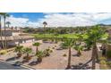 Beautiful view of lot surrounded by palm trees and green golf course at 38 Grand Miramar Dr, Henderson, NV 89011