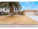 Charming single-story home with desert landscaping and a spacious two-car garage at 4719 Sparta Way, North Las Vegas, NV 89032