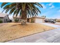 Charming single-story home with desert landscaping and a spacious two-car garage at 4719 Sparta Way, North Las Vegas, NV 89032