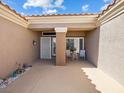 Cozy patio area with seating, ideal for relaxation and enjoying the outdoors at 10417 Sea Palms Ave, Las Vegas, NV 89134