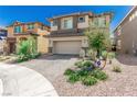 Charming two-story home with a two-car garage, beautiful landscaping, and an ADT security sign at 330 Spring Dove Ave, Henderson, NV 89011