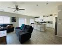 Open floor plan showcasing the seamless connection between the living room and kitchen at 330 Spring Dove Ave, Henderson, NV 89011
