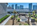 Exterior shot of spa area, landscaping, and a view of the city skyline at 4200 S Valley View Blvd # 2081, Las Vegas, NV 89103