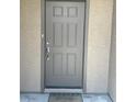 Elegant front door with decorative panels and a welcoming mat at 6092 Fox Creek Ave, Las Vegas, NV 89122
