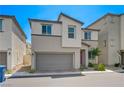 Contemporary two-story home with a two-car garage with minimal landscaping at 6940 Crescent Gold St, North Las Vegas, NV 89086