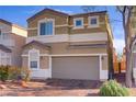 Charming two-story home with desert landscaping and a spacious two-car garage at 9535 Stills Way, Las Vegas, NV 89148