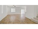 Bright and airy living room featuring modern flooring and abundant natural light at 9535 Stills Way, Las Vegas, NV 89148