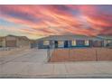 Charming single-story home with well-maintained landscaping and a spacious driveway at 4425 Sherrill Ave, Las Vegas, NV 89110