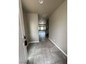 View of the entryway with tile flooring leading into the open living space at 8116 Russell Creek Ct, Las Vegas, NV 89139