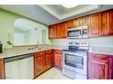 Efficient kitchen with stainless steel appliances and countertop seating at 2212 Sunfish Dr # C, Henderson, NV 89014
