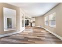 Bright living room with modern flooring flowing into an open-concept kitchen at 2301 Maverick St, Las Vegas, NV 89108