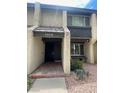 Exterior facade of a townhome featuring a tile entryway at 3278 Liahona Way, Las Vegas, NV 89121