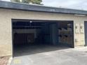 Attached garage with storage shelves, and a clean interior at 3278 Liahona Way, Las Vegas, NV 89121