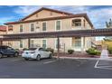 Two-story condo featuring assigned covered parking with meticulously maintained landscaping at 3351 Indian Shadow St # 204, Las Vegas, NV 89129