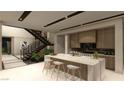 Modern kitchen featuring waterfall island, stainless steel appliances, wood cabinetry, and staircase access at 3530 Cosima Ln, Las Vegas, NV 89120
