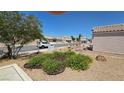 Well-kept home featuring desert landscaping, adding natural beauty to the property at 6113 Desert Haven Rd, Las Vegas, NV 89130