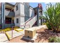 Condo exterior showcasing modern architecture with private balcony and landscaped front, a great curb appeal at 8600 W Charleston Blvd # 2085, Las Vegas, NV 89117