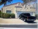 Charming single-story home with well-maintained landscaping and a private driveway, perfect for suburban living at 1667 Marion Bennet Dr, Las Vegas, NV 89106