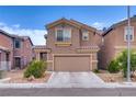 Attractive two-story home with a well-maintained front yard and a two-car garage at 4609 Hearts Desire Ave, Las Vegas, NV 89115